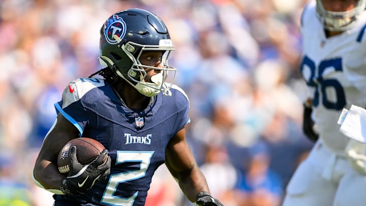 Oct 13, 2024; Nashville, Tennessee, USA;  Tennessee Titans running back Tyjae Spears (2) runs the ball against the Indianapolis Colts during the first half at Nissan Stadium. Mandatory Credit: Steve Roberts-Imagn Images
