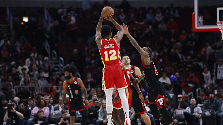 Apr 1, 2024; Chicago, Illinois, USA; Atlanta Hawks forward De'Andre Hunter (12) shoots against the