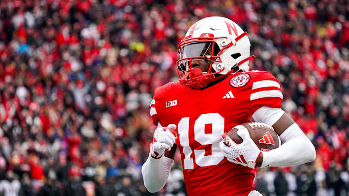 Oct 28, 2023; Lincoln, Nebraska, USA; Nebraska Cornhuskers wide receiver Jaylen Lloyd (19) scores a touchdown against the Purdue Boilermakers during the second quarter at Memorial Stadium. Mandatory Credit: Dylan Widger-Imagn Images