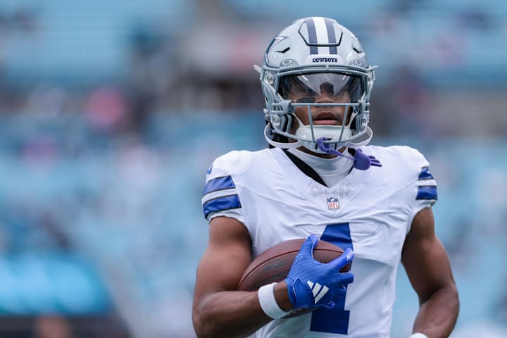 Dallas Cowboys wide receiver Jalen Tolbert warms up before the game against the Carolina Panthers.