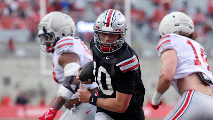 Apr 18, 2026; Columbus, OH, USA;  Ohio State Quarterback Julian Sayin (10) runs the ball for a touchdown during the annual spring game at Ohio Stadium. Mandatory Credit: Joseph Maiorana-Imagn Images 