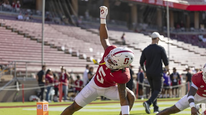 Sep 27, 2025; Stanford, California, USA;  Stanford Cardinal safety Jay Green (5) stretches before the start of the first quarter against the the San Jose State Spartans at Stanford Stadium. Mandatory Credit: Stan Szeto-Imagn Images

