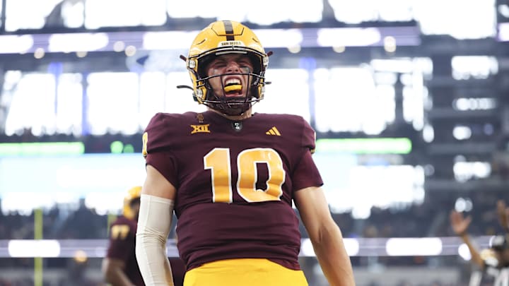 Dec 7, 2024; Arlington, TX, USA; Arizona State Sun Devils quarterback Sam Leavitt (10) reacts after running for a touchdown during the first quarter against the Iowa State Cyclones at AT&T Stadium. Mandatory Credit: Kevin Jairaj-Imagn Images