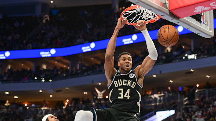Nov 22, 2024; Milwaukee, Wisconsin, USA; Milwaukee Bucks forward Giannis Antetokounmpo (34) dunks a basket in the fourth quarter against the Indiana Pacers at Fiserv Forum. Mandatory Credit: Benny Sieu-Imagn Images