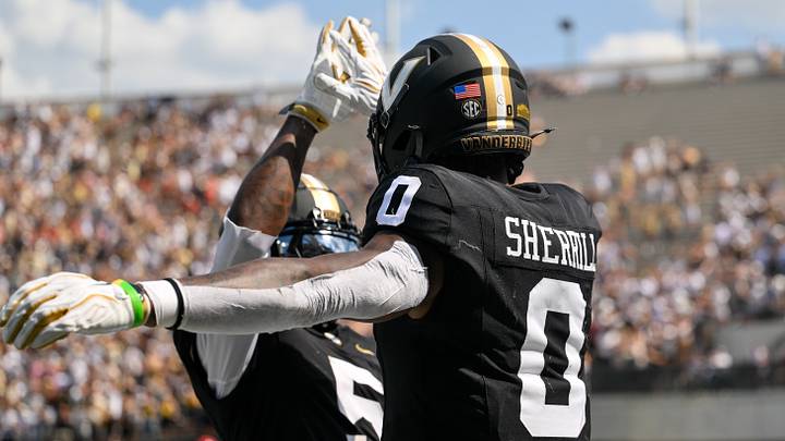 Sep 19, 2026; Nashville, Tennessee, USA; Vanderbilt Commodores wide receiver Junior Sherrill (0) celebrates the touchdown with wide receiver Tristen Brown (5) against the NC State Wolfpack during the first half at FirstBank Stadium. Mandatory Credit: Steve Roberts-Imagn Images Sep 19, 2026; Nashville, Tennessee, USA; Vanderbilt Commodores wide receiver Junior Sherrill (0) celebrates the touchdown with wide receiver Tristen Brown (5) against the NC State Wolfpack during the first half at FirstBank Stadium. Mandatory Credit: Steve Roberts-Imagn Images