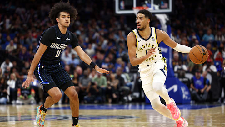Oct 28, 2024; Orlando, Florida, USA; Indiana Pacers guard Tyrese Haliburton (0) is guarded by Orlando Magic guard Anthony Black (0) in the third quarter at Kia Center. Mandatory Credit: Nathan Ray Seebeck-Imagn Images Oct 28, 2024; Orlando, Florida, USA; Indiana Pacers guard Tyrese Haliburton (0) is guarded by Orlando Magic guard Anthony Black (0) in the third quarter at Kia Center. Mandatory Credit: Nathan Ray Seebeck-Imagn Images