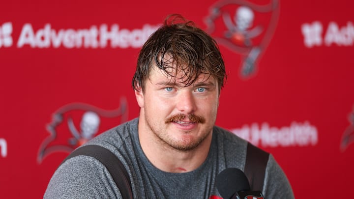Tampa Bay Buccaneers offensive tackle Luke Goedeke (67) talks to media after training camp.