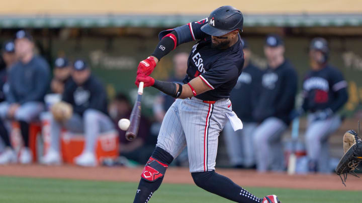 Minnesota Twins shortstop Willi Castro (50) hits a double against the Oakland Athletics during the first inning at Oakland-Alameda County Coliseum on June 21.