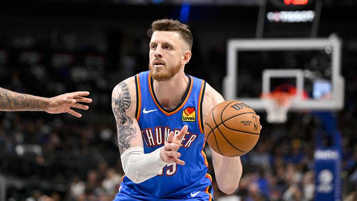 Mar 1, 2026; Dallas, Texas, USA; Oklahoma City Thunder center Isaiah Hartenstein (55) controls the ball during the game between the Mavericks and the Thunder at American Airlines Center. Mandatory Credit: Jerome Miron-Imagn Images