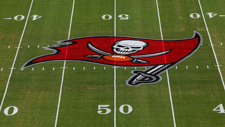 Sep 8, 2024; Tampa, Florida, USA; a view of the Tampa Bay Buccaneers logo at midfield before a game against the Washington Commanders at Raymond James Stadium. Mandatory Credit: Nathan Ray Seebeck-Imagn Images Sep 8, 2024; Tampa, Florida, USA; a view of the Tampa Bay Buccaneers logo at midfield before a game against the Washington Commanders at Raymond James Stadium. Mandatory Credit: Nathan Ray Seebeck-Imagn Images