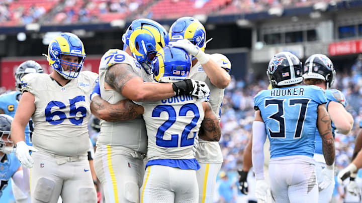 Sep 14, 2025; Nashville, Tennessee, USA; Los Angeles Rams running back Blake Corum (22) reacts after scoring a touchdown against the Tennessee Titans during the second half at Nissan Stadium. Mandatory Credit: Steve Roberts-Imagn Images