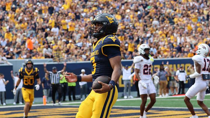 West Virginia University quarterback Michael Hawkins Jr. West Virginia University quarterback Michael Hawkins Jr.