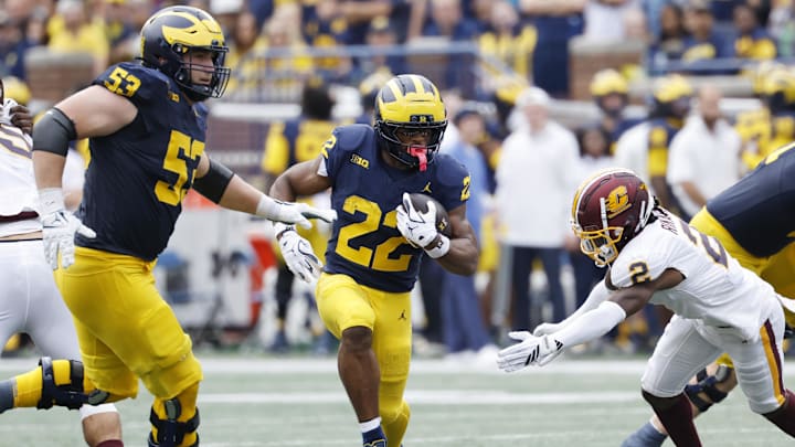 Sep 13, 2025; Ann Arbor, Michigan, USA;  Michigan Wolverines running back Justice Haynes (22) rushes in the first half against the Central Michigan Chippewas at Michigan Stadium. Mandatory Credit: Rick Osentoski-Imagn Images