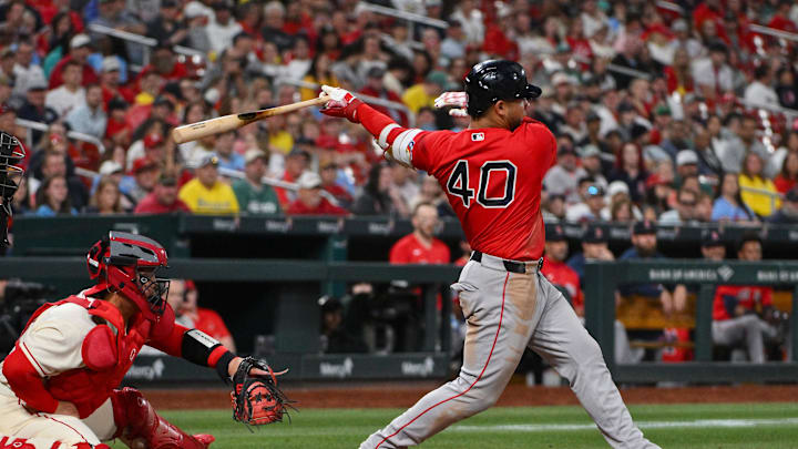 Apr 11, 2026; St. Louis, Missouri, USA; Boston Red Sox first baseman Willson Contreras (40) hits a one run single against the St. Louis Cardinals during the ninth inning at Busch Stadium. Mandatory Credit: Jeff Curry-Imagn Images