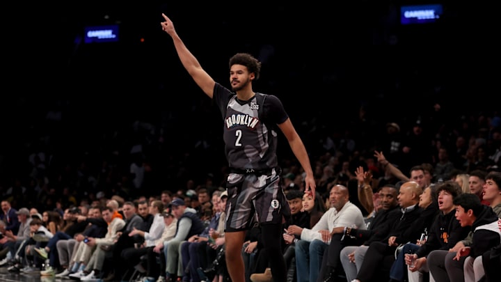 Dec 4, 2024; Brooklyn, New York, USA; Brooklyn Nets forward Cameron Johnson (2) celebrates his three point shot against the Indiana Pacers during the third quarter at Barclays Center. Mandatory Credit: Brad Penner-Imagn Images