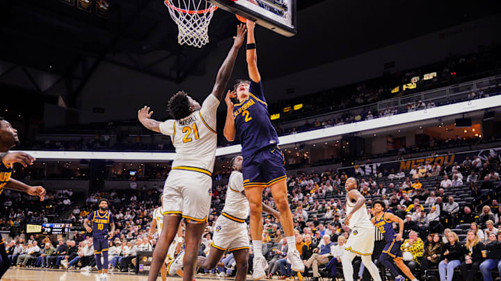 Dec 3, 2024; Columbia, Missouri, USA; California Golden Bears guard Andrej Stojakovic (2) shoots as Missouri Tigers center Peyton Marshall (21) defends during the second half at Mizzou Arena. Mandatory Credit: Denny Medley-Imagn Images Dec 3, 2024; Columbia, Missouri, USA; California Golden Bears guard Andrej Stojakovic (2) shoots as Missouri Tigers center Peyton Marshall (21) defends during the second half at Mizzou Arena. Mandatory Credit: Denny Medley-Imagn Images
