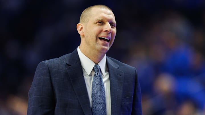 Jan 4, 2025; Lexington, Kentucky, USA; Kentucky Wildcats head coach Mark Pope talks to his players and assistant coaches on the bench during the first half against the Florida Gators at Rupp Arena at Central Bank Center. Mandatory Credit: Jordan Prather-Imagn Images Jan 4, 2025; Lexington, Kentucky, USA; Kentucky Wildcats head coach Mark Pope talks to his players and assistant coaches on the bench during the first half against the Florida Gators at Rupp Arena at Central Bank Center. Mandatory Credit: Jordan Prather-Imagn Images