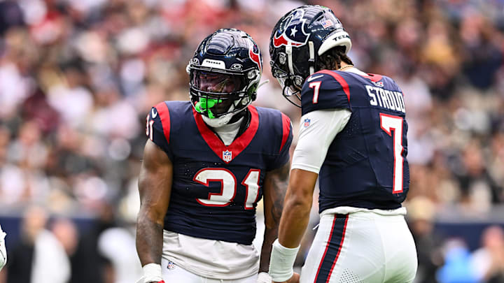 Houston Texans running back Dameon Pierce (31) and quarterback CJ Stroud.