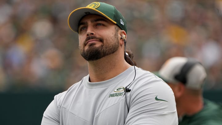 Sep 24, 2023; Green Bay, Wisconsin, USA; Injured Green Bay Packers offensive tackle David Bakhtiari watches his team during the first quarter of their game against the New Orleans Saints at Lambeau Field. Mandatory Credit: Mark Hoffman-USA TODAY Sports