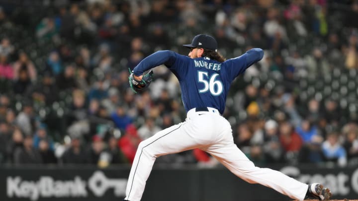 Seattle Mariners relief pitcher Penn Murfee (56) pitches to the Los Angeles Angels during the fifth inning at T-Mobile Park in 2023. Seattle Mariners relief pitcher Penn Murfee (56) pitches to the Los Angeles Angels during the fifth inning at T-Mobile Park in 2023.
