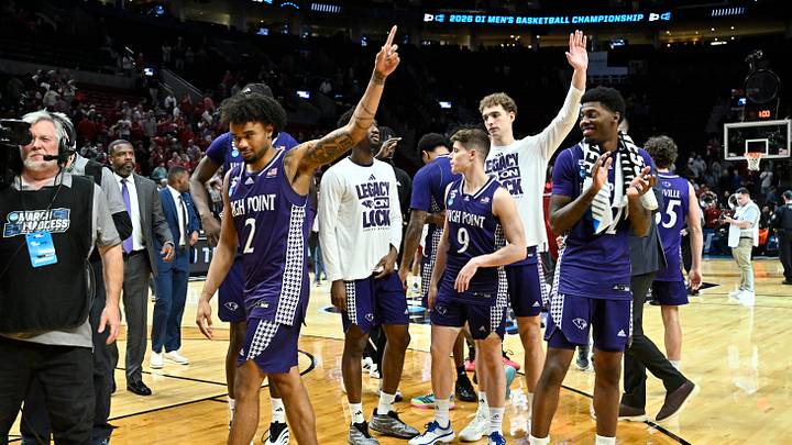 Mar 21, 2026; Portland, OR, USA; High Point Panthers players salute the fans after losing to the Arkansas Razorbacks during a second round game of the men's 2026 NCAA Tournament at Moda Center. Mandatory Credit: Craig Strobeck-Imagn Images Mar 21, 2026; Portland, OR, USA; High Point Panthers players salute the fans after losing to the Arkansas Razorbacks during a second round game of the men's 2026 NCAA Tournament at Moda Center. Mandatory Credit: Craig Strobeck-Imagn Images