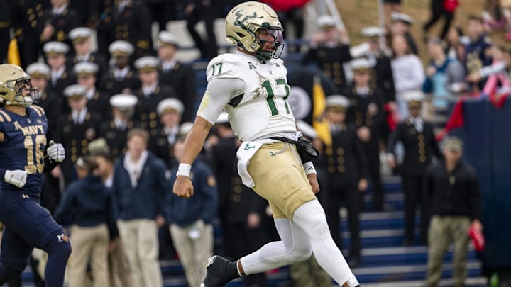 Nov 15, 2025; Annapolis, Maryland, USA; South Florida Bulls quarterback Byrum Brown (17) runs for a touchdown against the Navy Midshipmen during the second half at Navy-Marine Corps Memorial Stadium. Navy Midshipmen defeated South Florida Bulls 41-28. Mandatory Credit: Tommy Gilligan-Imagn Images