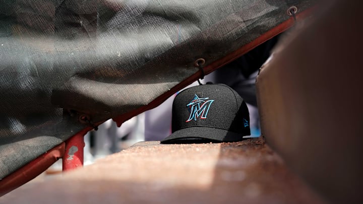 Apr 11, 2019; Cincinnati, OH, USA; A view of a New Era Miami Marlins hat in the dugout during the game against the Cincinnati Reds at Great American Ball Park. Apr 11, 2019; Cincinnati, OH, USA; A view of a New Era Miami Marlins hat in the dugout during the game against the Cincinnati Reds at Great American Ball Park.