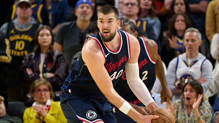 Apr 13, 2025; San Francisco, California, USA; LA Clippers center Ivica Zubac (40) rebounds the ball against the Golden State Warriors during the fourth quarter at Chase Center. Mandatory Credit: Robert Edwards-Imagn Images Apr 13, 2025; San Francisco, California, USA; LA Clippers center Ivica Zubac (40) rebounds the ball against the Golden State Warriors during the fourth quarter at Chase Center. Mandatory Credit: Robert Edwards-Imagn Images