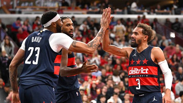 Oct 24, 2026; Chicago, Illinois, USA;  Washington Wizards forward Anthony Davis (23) and guard Trae Young (3) celebrate during the second half against the Chicago Bulls at United Center.  Mandatory Credit: Patrick Gorski-Imagn Images