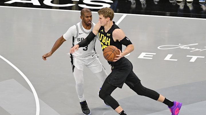 Nov 26, 2024; Salt Lake City, Utah, USA; Utah Jazz forward/center Lauri Markkanen (23) dribbles around San Antonio Spurs guard Chris Paul (3) during the second half at Delta Center. Mandatory Credit: Christopher Creveling-Imagn Images Nov 26, 2024; Salt Lake City, Utah, USA; Utah Jazz forward/center Lauri Markkanen (23) dribbles around San Antonio Spurs guard Chris Paul (3) during the second half at Delta Center. Mandatory Credit: Christopher Creveling-Imagn Images
