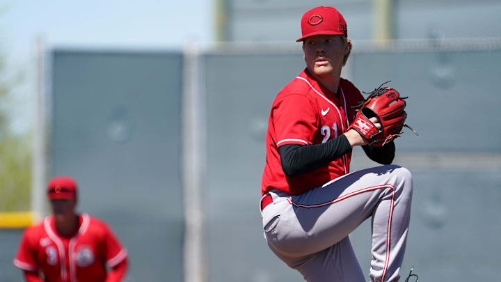 Cincinnati Reds minor league pitcher Andrew Abbott (21) delivers during a spring training game. Cincinnati Reds minor league pitcher Andrew Abbott (21) delivers during a spring training game.