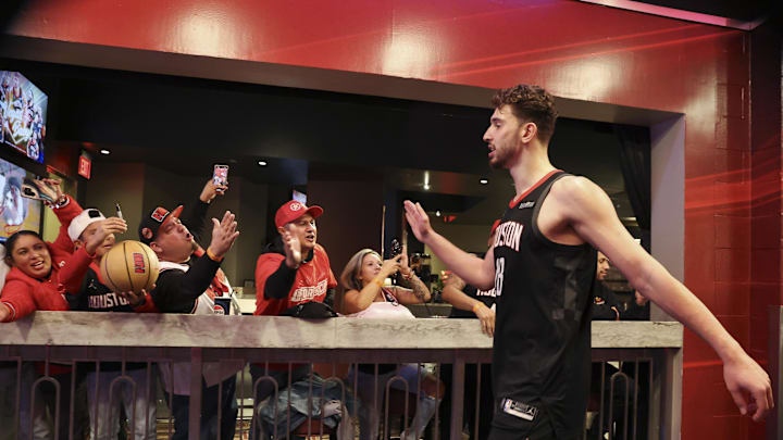 Dec 11, 2024; Houston, Texas, USA; Houston Rockets center Alperen Sengun (28) celebrates with fans after the game against the Golden State Warriors at Toyota Center. Mandatory Credit: Troy Taormina-Imagn Images Dec 11, 2024; Houston, Texas, USA; Houston Rockets center Alperen Sengun (28) celebrates with fans after the game against the Golden State Warriors at Toyota Center. Mandatory Credit: Troy Taormina-Imagn Images