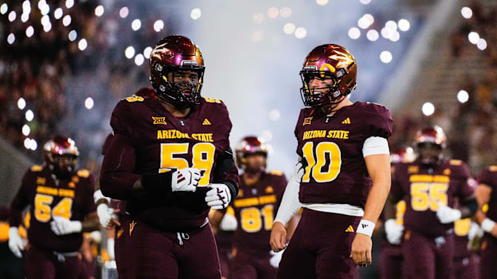 Sep 13, 2025; Tempe, Arizona, USA;   Arizona State Sun Devils quarterback Sam Leavitt (10) and Arizona State Sun Devils offensive lineman Max Iheanachor (58) during runout at Mountain America Stadium against the Texas State Bobcats. Mandatory Credit: Arianna Grainey-Imagn Images