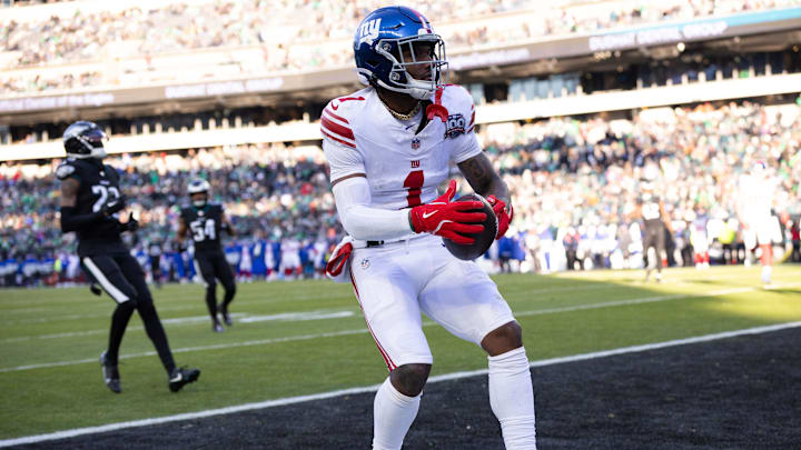 Jan 5, 2025; Philadelphia, Pennsylvania, USA; New York Giants wide receiver Malik Nabers (1) scores a touchdown against the Philadelphia Eagles during the fourth quarter at Lincoln Financial Field. Mandatory Credit: Bill Streicher-Imagn Images
