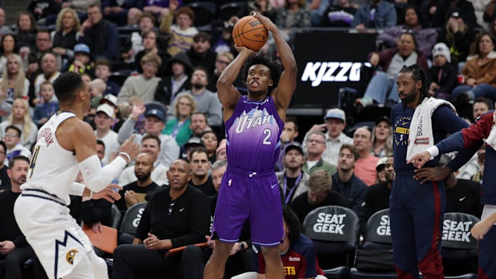 Dec 30, 2024; Salt Lake City, Utah, USA;  Utah Jazz guard Collin Sexton (2) shoots the ball during the second half against the Denver Nuggets at Delta Center. Mandatory Credit: Chris Nicoll-Imagn Images