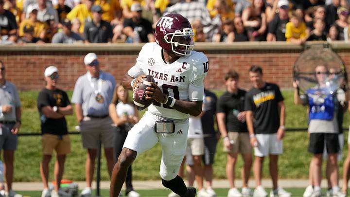 Oct 10, 2026; Columbia, Missouri, USA; Texas A&M Aggies quarterback Marcel Reed (10) drops back to pass against the Missouri Tigers during the first half of the game at Faurot Field at Memorial Stadium. Mandatory Credit: Denny Medley-Imagn Images