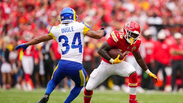 Aug 15, 2026; Kansas City, Missouri, USA; Kansas City Chiefs running back Emmett Johnson (10) runs the ball against Los Angeles Rams safety Tanner Ingle (34) during the first half at at Arrowhead Stadium. Mandatory Credit: Jay Biggerstaff-Imagn Images Aug 15, 2026; Kansas City, Missouri, USA; Kansas City Chiefs running back Emmett Johnson (10) runs the ball against Los Angeles Rams safety Tanner Ingle (34) during the first half at at Arrowhead Stadium. Mandatory Credit: Jay Biggerstaff-Imagn Images