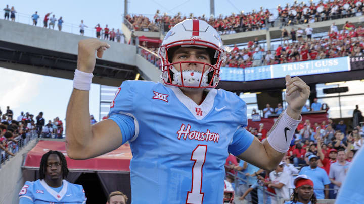 Houston Cougars quarterback Conner Weigman (1) enters the field before playing against the Texas Tech Raiders at TDECU Stadium. Houston Cougars quarterback Conner Weigman (1) enters the field before playing against the Texas Tech Raiders at TDECU Stadium.