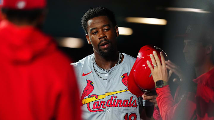 Sep 25, 2024; Denver, Colorado, USA; St. Louis Cardinals right fielder Jordan Walker (18) celebrates scoring a run in the fourth inning against the Colorado Rockies at Coors Field. Mandatory Credit: Ron Chenoy-Imagn Images