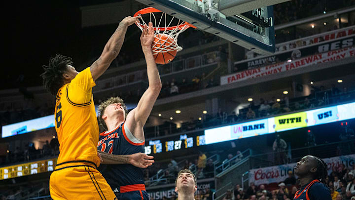 Iowa's Tavion Banks dunks the ball during a game at Casey's Center on Saturday, Dec. 20, 2025 in Des Moines.