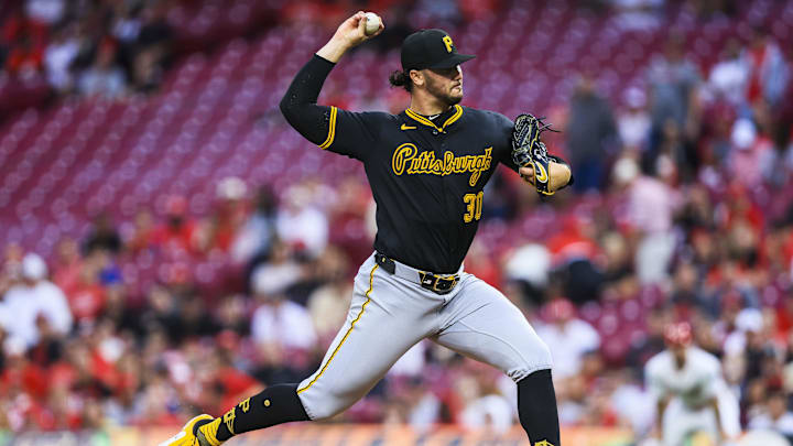 Sep 24, 2025; Cincinnati, Ohio, USA; Pittsburgh Pirates starting pitcher Paul Skenes (30) pitches against the Cincinnati Reds in the first inning at Great American Ball Park. Mandatory Credit: Katie Stratman-Imagn Images