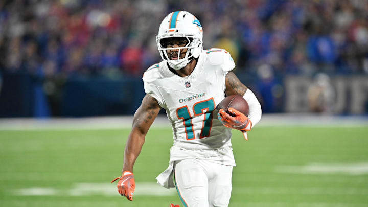 Sep 18, 2025; Orchard Park, New York, USA; Miami Dolphins wide receiver Jaylen Waddle (17) runs against the Buffalo Bills in the fourth quarter at Highmark Stadium