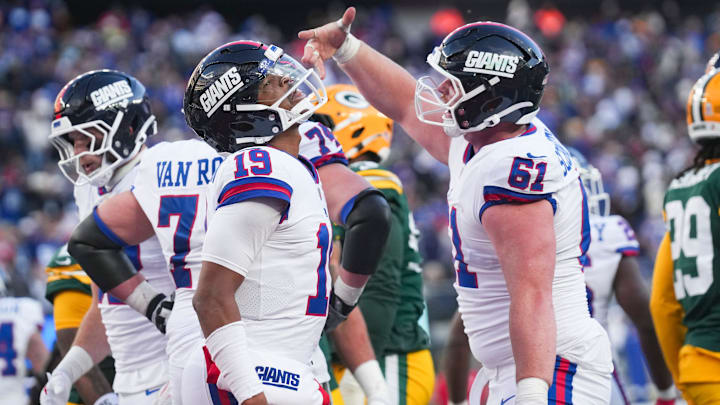 New York Giants quarterback Jameis Winston (19) and New York Giants center John Michael Schmitz Jr. (61) celebrate after scoring a touchdown in a game against the Green Bay Packers at MetLife Stadium, Nov 16, 2025, East Rutherford, NJ, USA.