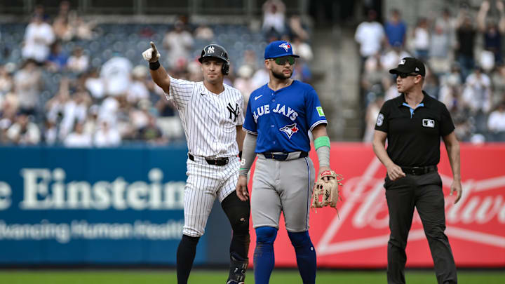 Sep 6, 2025; Bronx, New York, USA; New York Yankees shortstop Anthony Volpe (11) reacts after hitting a double against the Toronto Blue Jays during the sixth inning at Yankee Stadium. Mandatory Credit: John Jones-Imagn Images