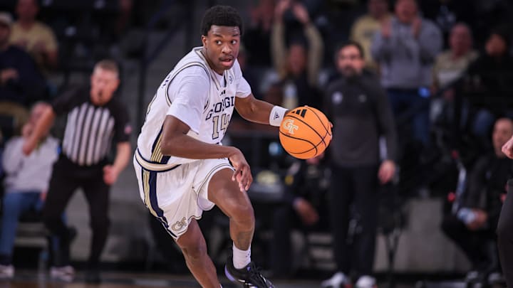 Jan 3, 2026; Atlanta, Georgia, USA; Georgia Tech Yellow Jackets forward Kowacie Reeves Jr. (14) dribbles against the Boston College Eagles in the second half at McCamish Pavilion. Mandatory Credit: Brett Davis-Imagn Images