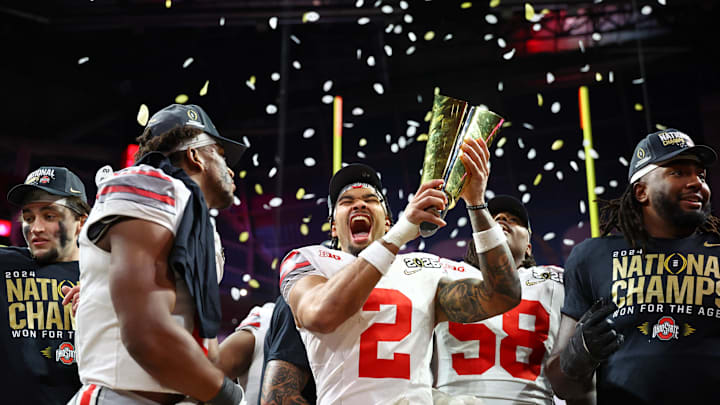 Jan 20, 2025; Atlanta, GA, USA; Ohio State Buckeyes wide receiver Emeka Egbuka (2) celebrates after winning against the Notre Dame Fighting Irish in the CFP National Championship college football game at Mercedes-Benz Stadium. Mandatory Credit: Mark J. Rebilas-Imagn Images