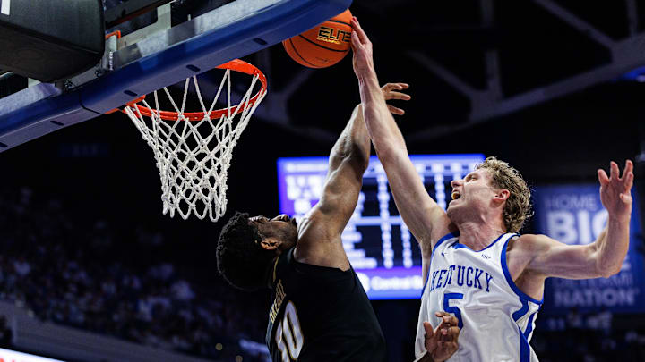 Feb 28, 2026; Lexington, Kentucky, USA; Kentucky Wildcats guard Collin Chandler (5) goes to the rim against Vanderbilt Commodores forward Ak Okereke (10) during the second half at Rupp Arena at Central Bank Center. Mandatory Credit: Jordan Prather-Imagn Images Feb 28, 2026; Lexington, Kentucky, USA; Kentucky Wildcats guard Collin Chandler (5) goes to the rim against Vanderbilt Commodores forward Ak Okereke (10) during the second half at Rupp Arena at Central Bank Center. Mandatory Credit: Jordan Prather-Imagn Images