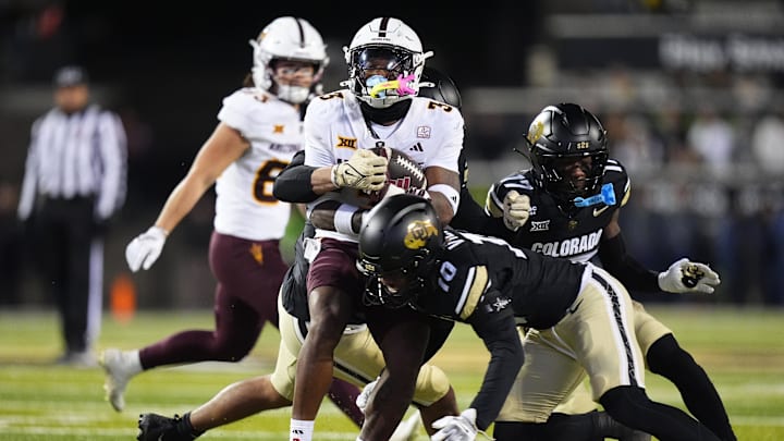 Nov 22, 2025; Boulder, Colorado, USA; Colorado Buffaloes defensive back Makari Vickers (10) tackles Arizona State Sun Devils running back Raleek Brown (3) in the first quarter at Folsom Field. Mandatory Credit: Ron Chenoy-Imagn Images