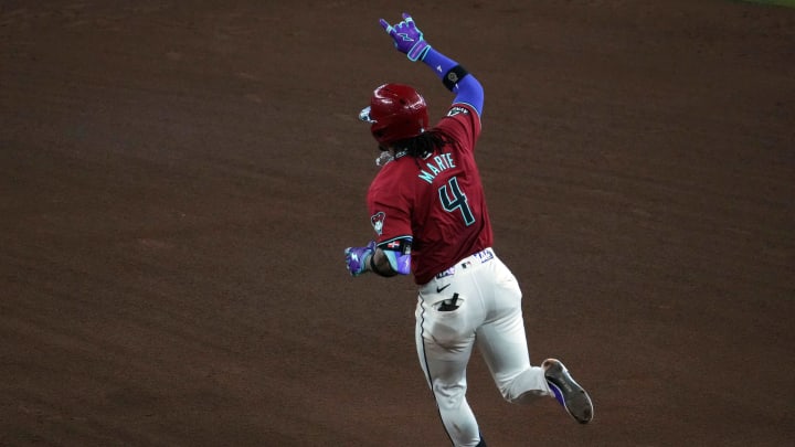 Jul 14, 2024; Phoenix, Arizona, USA; Arizona Diamondbacks second base Ketel Marte (4) runs the bases after hitting a grand slam home run against the Toronto Blue Jays during the fifth inning at Chase Field. Mandatory Credit: Joe Camporeale-USA TODAY Sports Jul 14, 2024; Phoenix, Arizona, USA; Arizona Diamondbacks second base Ketel Marte (4) runs the bases after hitting a grand slam home run against the Toronto Blue Jays during the fifth inning at Chase Field. Mandatory Credit: Joe Camporeale-USA TODAY Sports