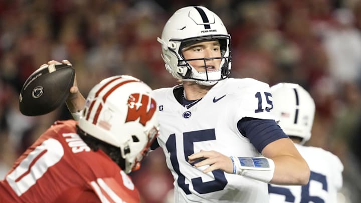 Penn State Nittany Lions quarterback Drew Allar throws a pass during the second quarter against the Wisconsin Badgers at Camp Randall Stadium. Penn State Nittany Lions quarterback Drew Allar throws a pass during the second quarter against the Wisconsin Badgers at Camp Randall Stadium.